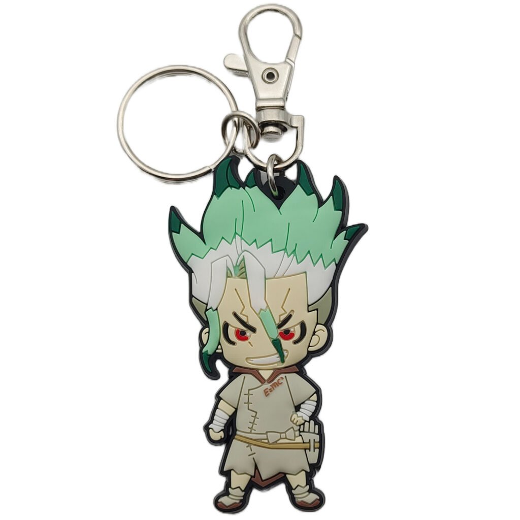 Dr. Stone PVC keychain features a lobster claw clasp and keyring.